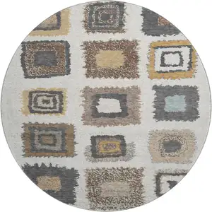 Photo of 8' Ivory Gray And Brown Geometric Washable Round Rug With UV Protection