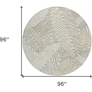 Photo of 8' Ivory Gray And Brown Round Floral Washable Indoor Outdoor Area Rug