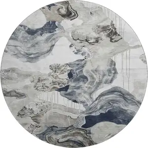Photo of 8' Ivory Gray And Charcoal Abstract Washable Round Rug With UV Protection