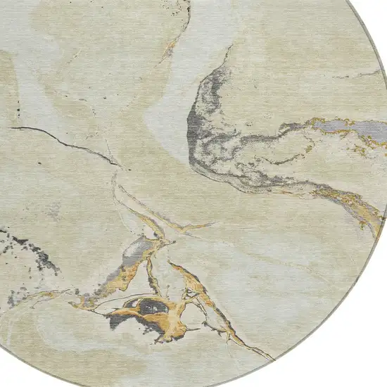 8' Ivory Gray And Gold Round Abstract Washable Indoor Outdoor Area Rug Photo 4