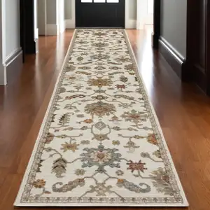 Photo of 12' Ivory Gray And Orange Oriental Runner Rug