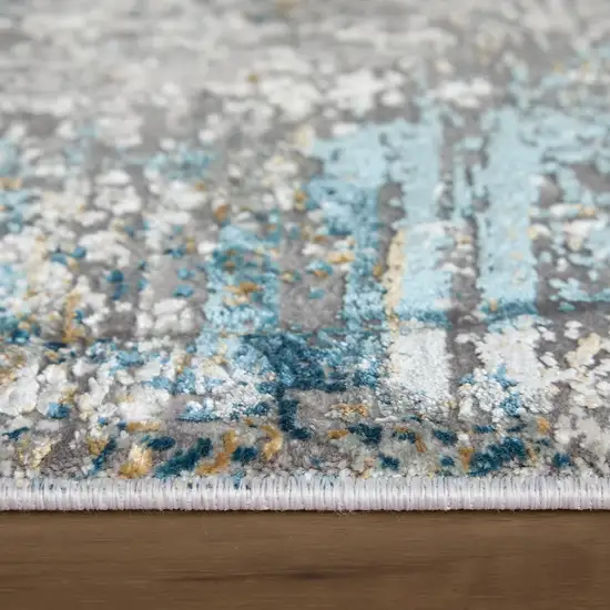 10' Ivory Gray and Blue Abstract Power Loom Runner Rug With Fringe Photo 5
