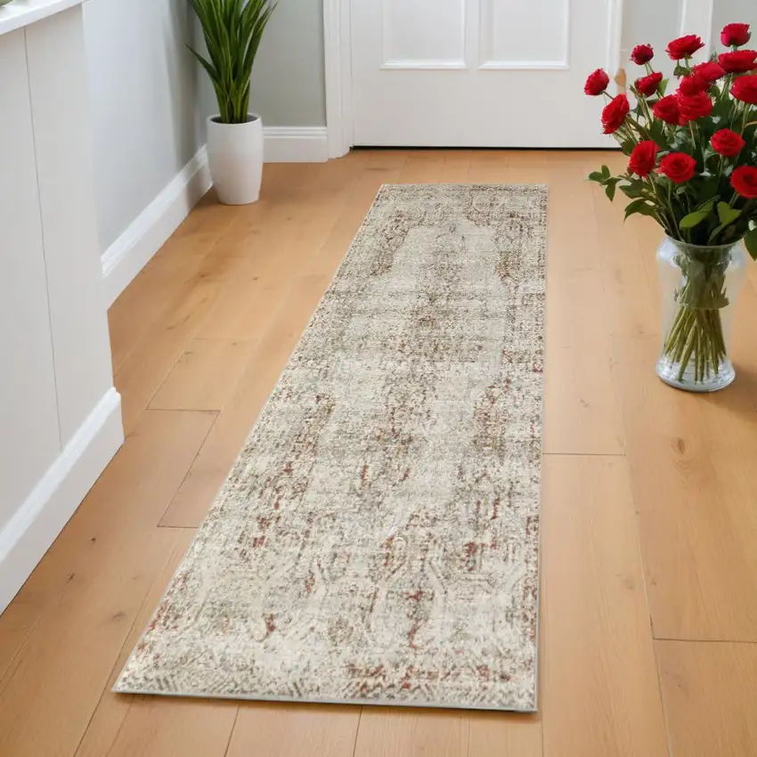 8' Ivory Gray and Brown Abstract Power Loom Worn Faded Runner Rug With Fringe Photo 1