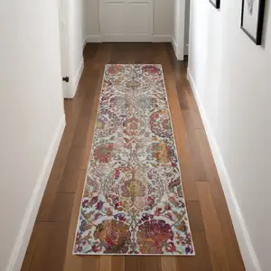 Photo of 8' Ivory Gray and Orange Floral Distressed Non Skid Runner Rug
