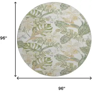 Photo of 8' Ivory Green And Beige Floral Washable Round Rug With UV Protection