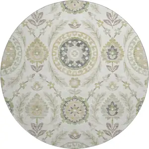 Photo of 8' Ivory Green And Gold Floral Washable Round Rug With UV Protection