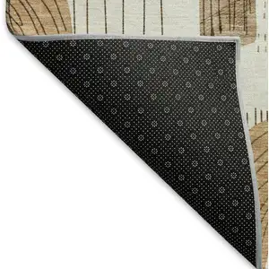 Photo of 8' Ivory Khaki And Beige Geometric Washable Round Rug With UV Protection