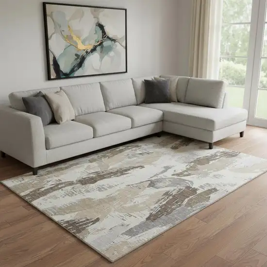 8' Ivory Khaki And Taupe Abstract Washable Area Rug With UV Protection Photo 2