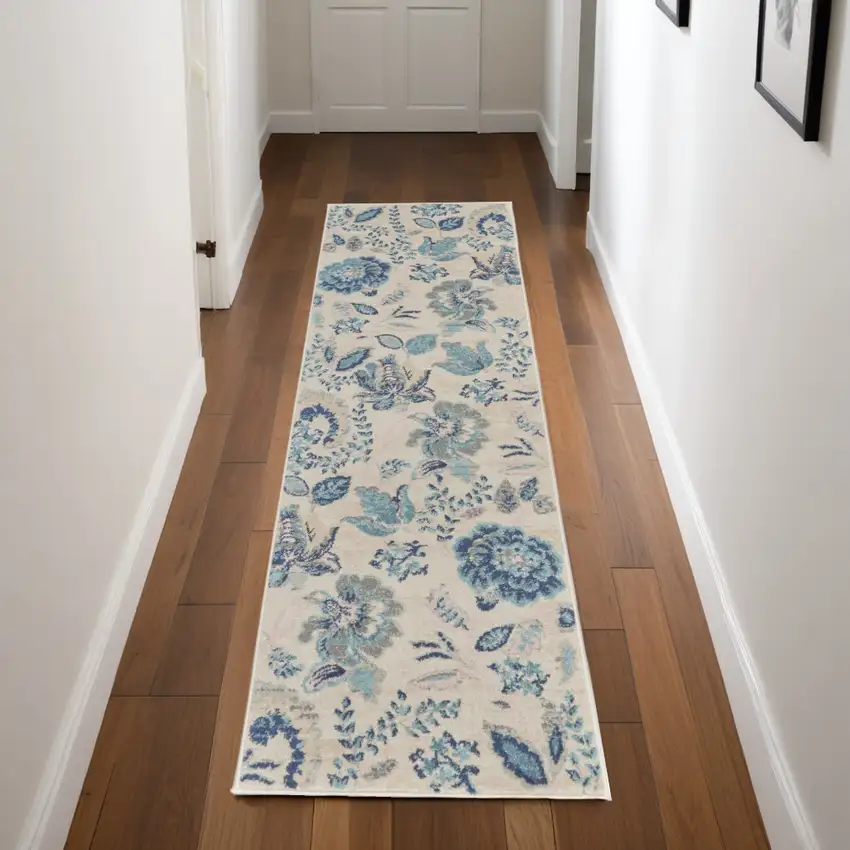 7' Ivory Navy Blue And Light Blue Floral Runner Rug Photo 1
