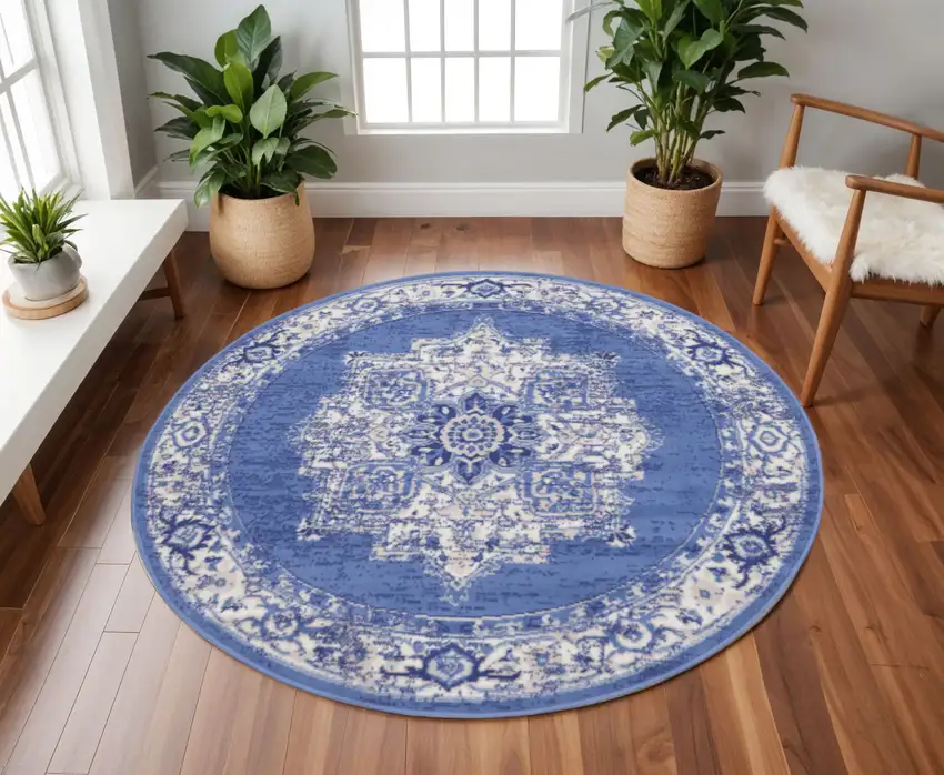 8' Ivory Navy Blue and Beige Floral Medallion Round Rug Photo 1