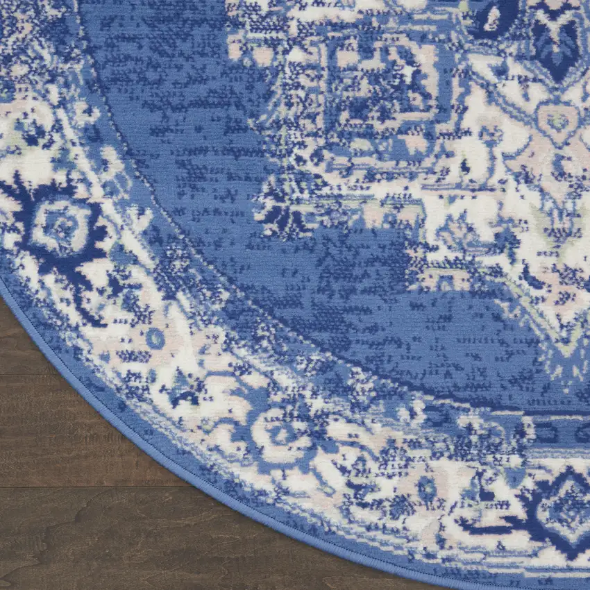8' Ivory Navy Blue and Beige Floral Medallion Round Rug Photo 9