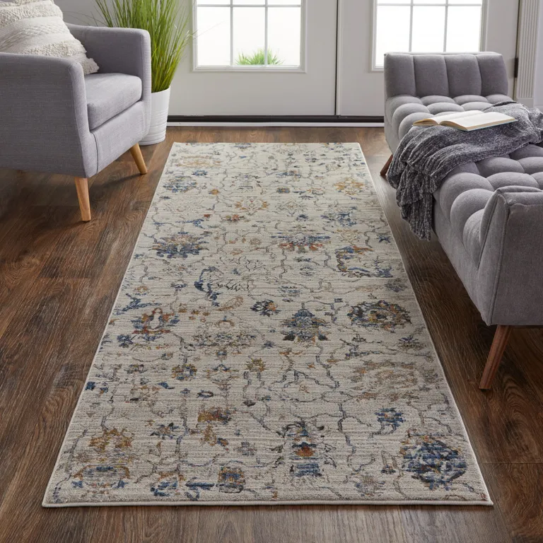 12' Ivory Orange And Blue Floral Power Loom Distressed Runner Rug With Fringe Photo 1