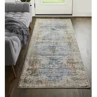 Photo of 12' Ivory Orange And Blue Floral Power Loom Distressed Runner Rug With Fringe