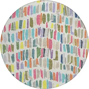 Photo of 8' Ivory Orange And Green Round Striped Washable Indoor Outdoor Area Rug