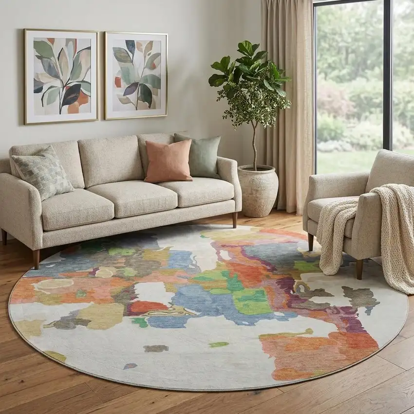 8' Ivory Orange Blue And Green Abstract Washable Round Rug With UV Protection Photo 1