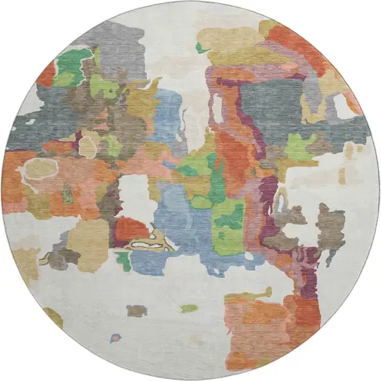 8' Ivory Orange Blue And Green Abstract Washable Round Rug With UV Protection Photo 1