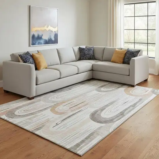 8' Ivory Peach And Taupe Geometric Washable Area Rug With UV Protection Photo 2