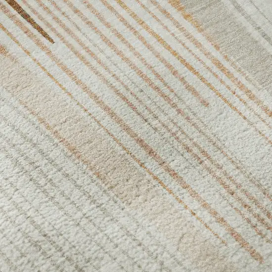 8' Ivory Peach And Taupe Geometric Washable Area Rug With UV Protection Photo 9