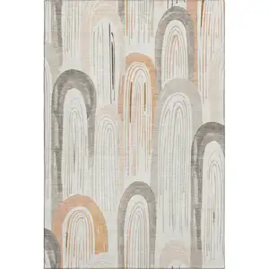 Photo of 8' Ivory Peach And Taupe Geometric Washable Area Rug With UV Protection
