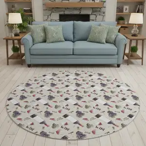 Photo of 8' Ivory Purple And Green Geometric Washable Round Rug With UV Protection