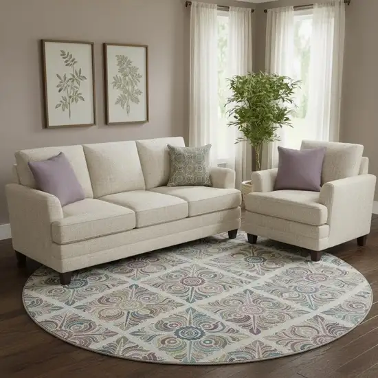 8' Ivory Purple And Teal Medallion Washable Round Rug With UV Protection Photo 1