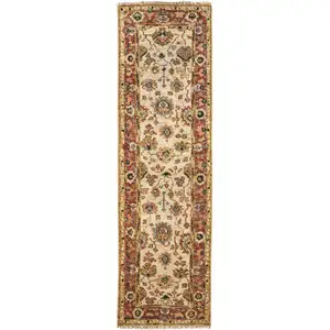 Photo of 8' Ivory Red And Blue Wool Floral Hand Knotted Stain Resistant Runner Rug