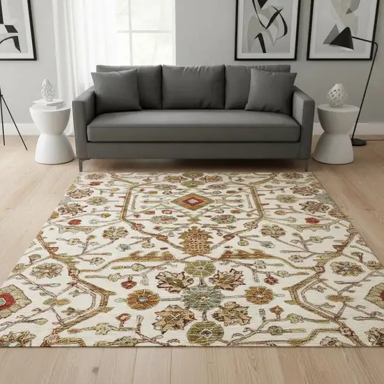 8' Ivory Red And Gold Oriental Washable Round Rug With UV Protection Photo 2