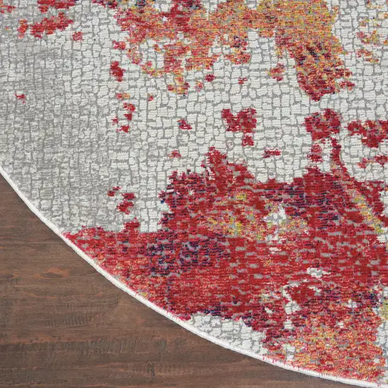 6' Ivory Red and Blue Abstract Distressed Non Skid Round Rug Photo 4