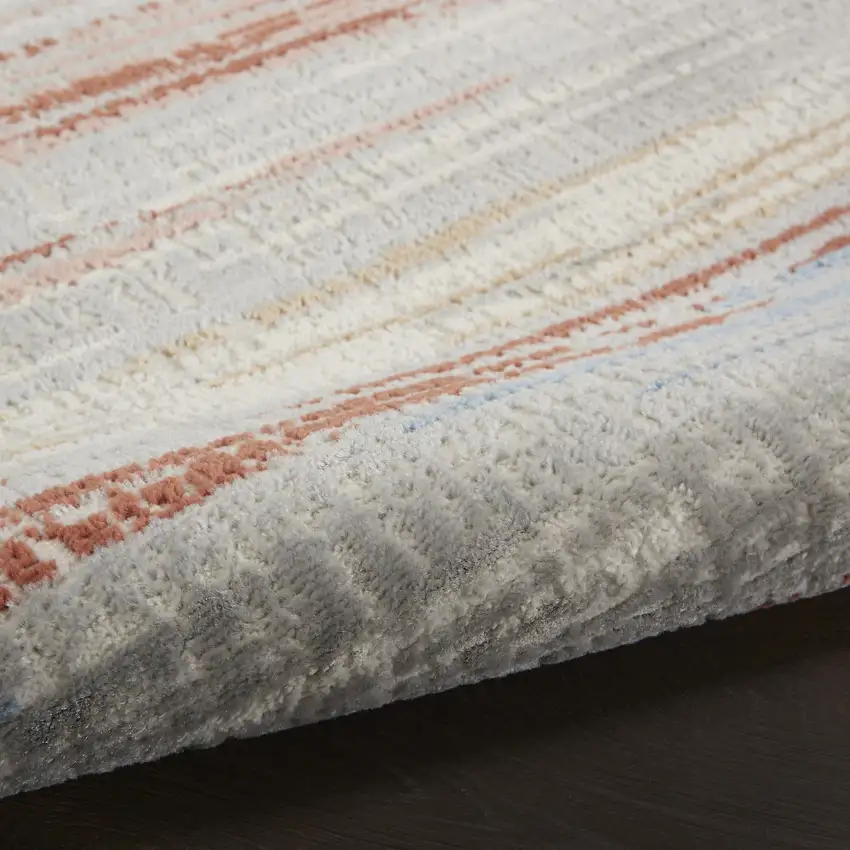 8' Ivory Red and Blue Abstract Non Skid Runner Rug Photo 4