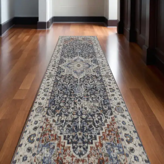 12' Ivory Red and Blue Oriental Power Loom Runner Rug With Fringe Photo 1
