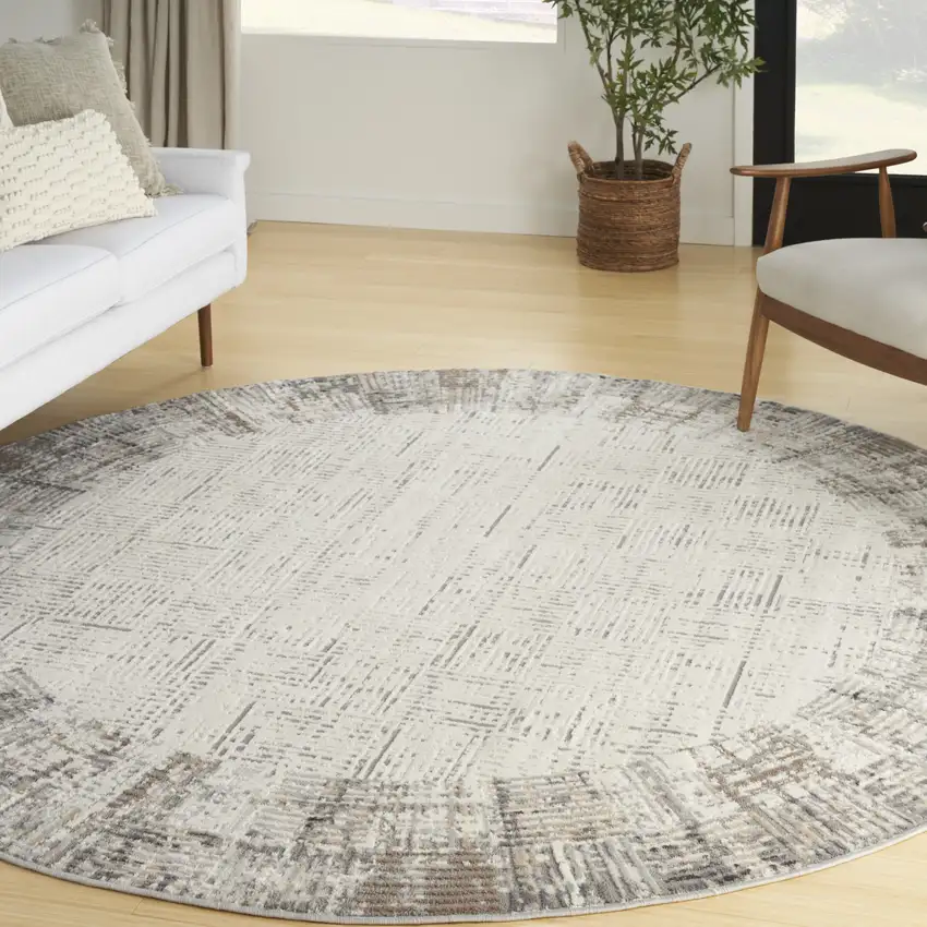 8' Ivory Round Abstract Power Loom Area Rug Photo 5