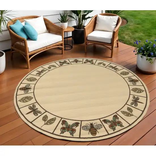 Brown and Ivory Round Abstract Stain Resistant Indoor Outdoor Area Rug Photo 1