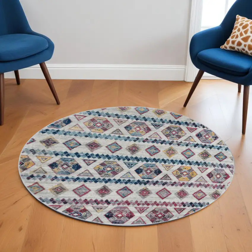 6' Ivory Blue and Orange Geometric Power Loom Round Rug Photo 1