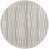 Photo of 4' Ivory Round Ombre Tufted Handmade Area Rug