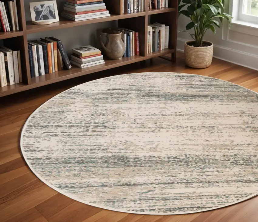8' Gray and Ivory Abstract Power Loom Round Rug Photo 1