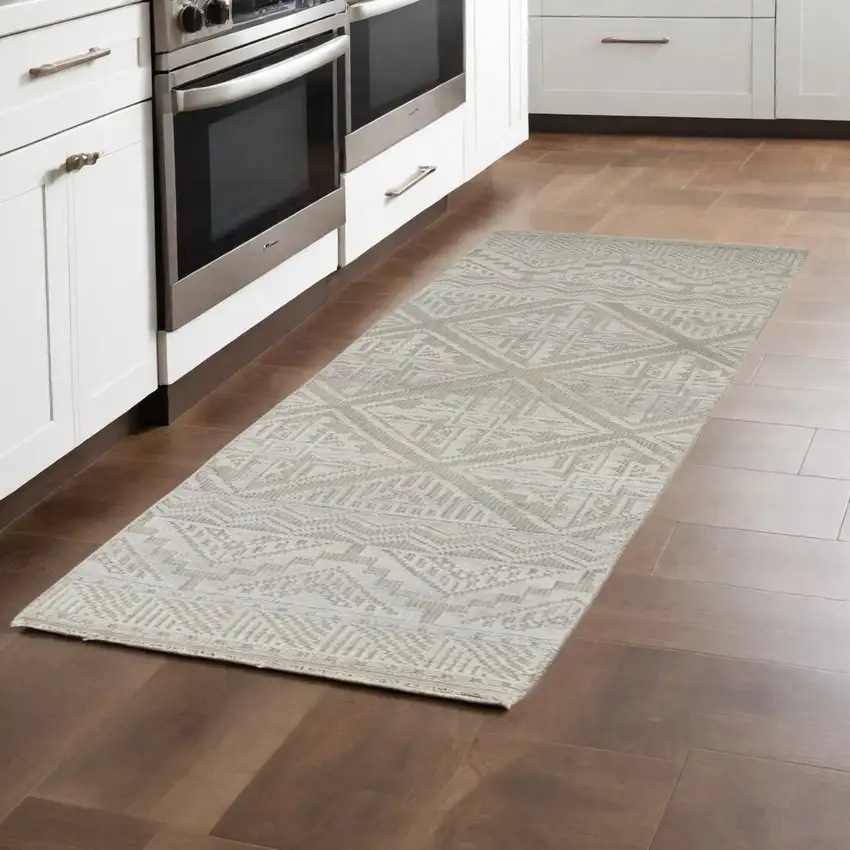 10' Gray and Ivory Geometric Hand Knotted Runner Rug With Fringe Photo 1