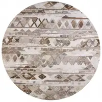 Photo of 8' Ivory Tan And Gray Round Wool Abstract Tufted Handmade Area Rug