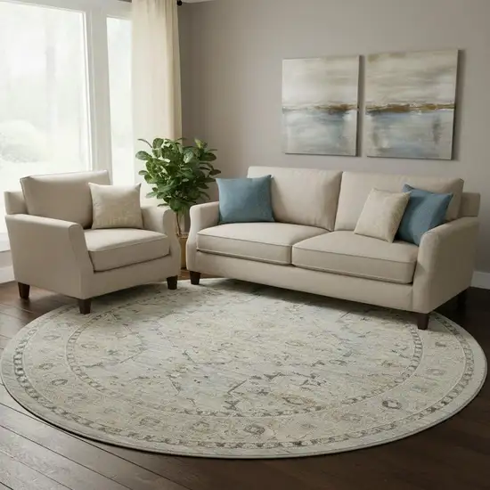 8' Ivory Tan And Light Blue Floral Medallion Distressed Round Rug With Fringe Photo 1
