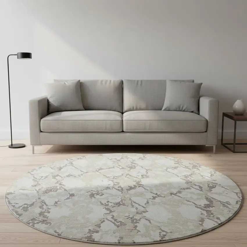 8' Ivory Taupe And Beige Abstract Washable Round Rug With UV Protection Photo 2