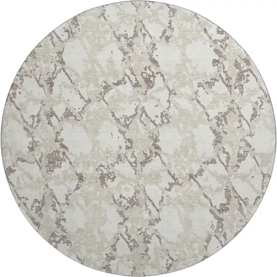 8' Ivory Taupe And Beige Abstract Washable Round Rug With UV Protection Photo 1