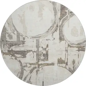 Photo of 8' Ivory Taupe And Beige Geometric Washable Round Rug With UV Protection