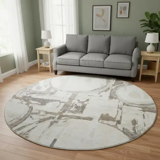 8' Ivory Taupe And Beige Geometric Washable Round Rug With UV Protection Photo 2