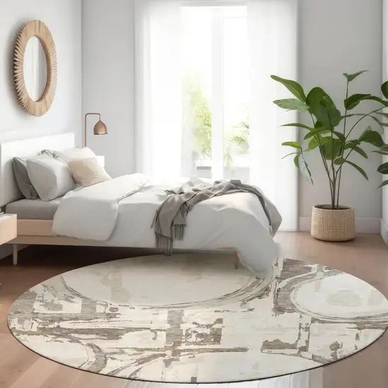 8' Ivory Taupe And Beige Geometric Washable Round Rug With UV Protection Photo 5