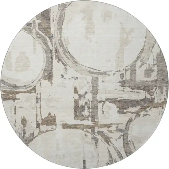 8' Ivory Taupe And Beige Geometric Washable Round Rug With UV Protection Photo 4