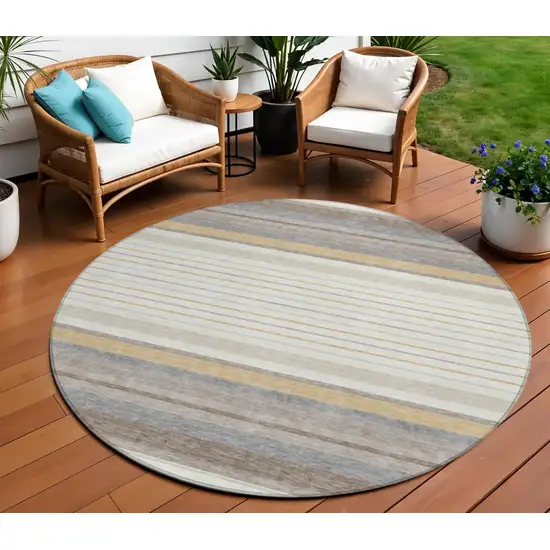 8' Ivory Taupe And Beige Round Striped Washable Indoor Outdoor Area Rug Photo 1