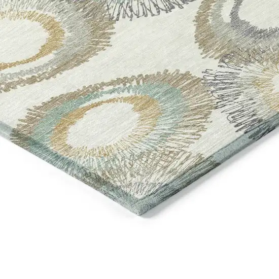 8' Ivory Taupe And Gold Round Geometric Washable Indoor Outdoor Area Rug Photo 9