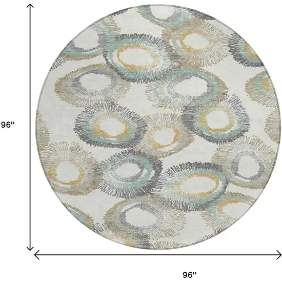 8' Ivory Taupe And Gold Round Geometric Washable Indoor Outdoor Area Rug Photo 3