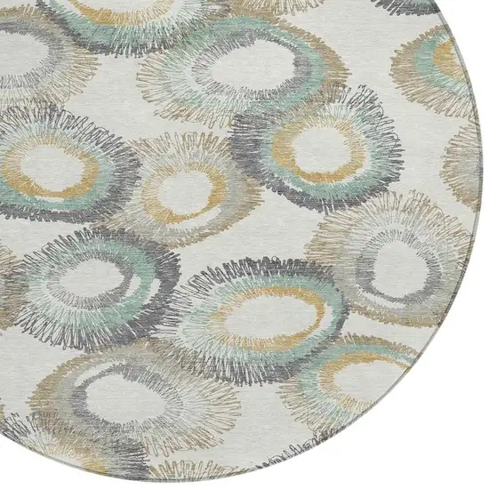 8' Ivory Taupe And Gold Round Geometric Washable Indoor Outdoor Area Rug Photo 8
