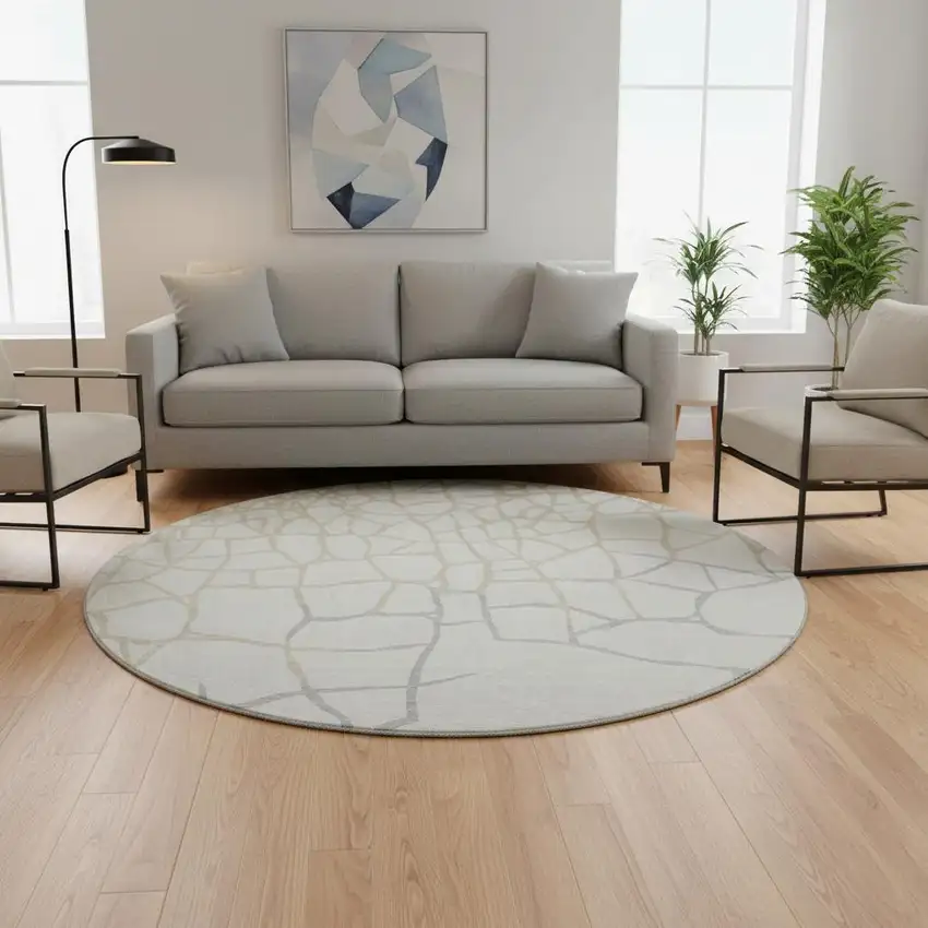 8' Ivory Taupe And Gray Abstract Geometric Washable Round Rug With UV Protection Photo 2