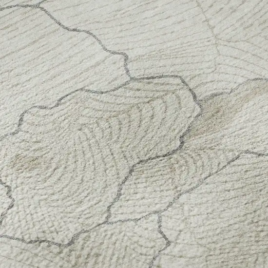 8' Ivory Taupe And Gray Abstract Washable Round Rug With UV Protection Photo 7